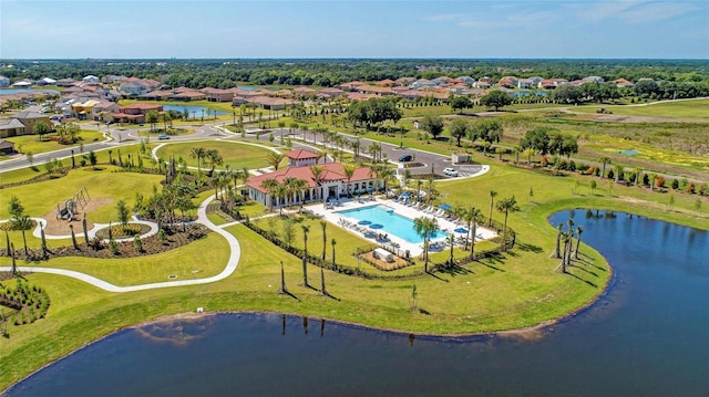 birds eye view of property featuring a water view