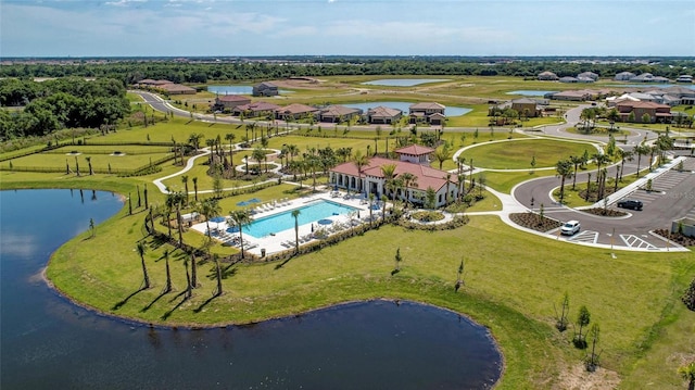 bird's eye view with a water view