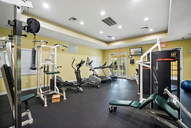 workout area with recessed lighting, visible vents, and baseboards