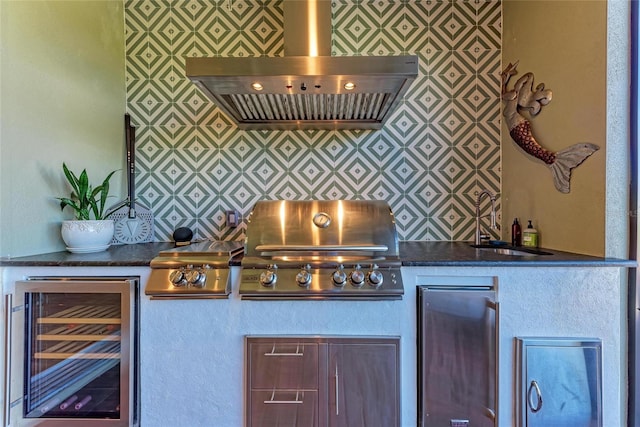 bar featuring a bar, wall chimney range hood, beverage cooler, and fridge