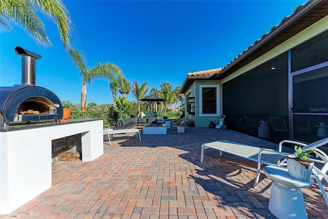 view of patio / terrace featuring outdoor lounge area and area for grilling