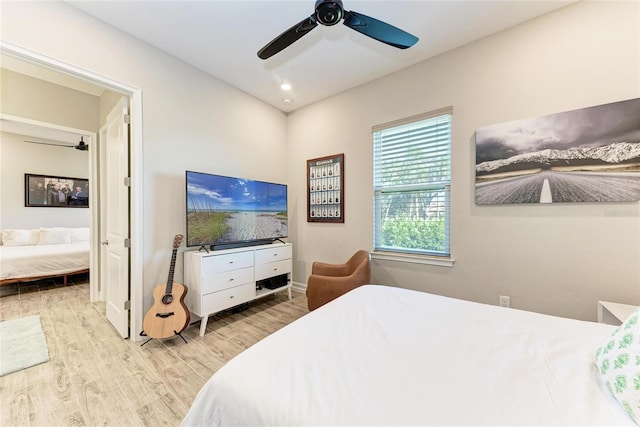 bedroom featuring baseboards, a ceiling fan, wood finished floors, and recessed lighting