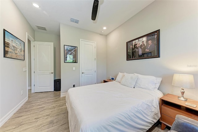 bedroom featuring recessed lighting, a ceiling fan, baseboards, visible vents, and light wood-type flooring