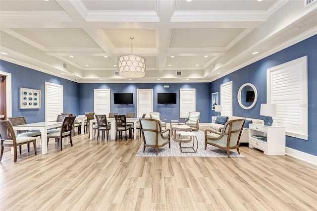 interior space with light wood finished floors, visible vents, coffered ceiling, and beam ceiling