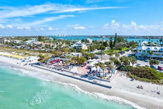 bird's eye view featuring a view of the beach and a water view