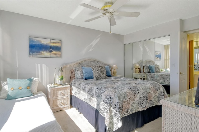 bedroom featuring a closet, carpet floors, and ceiling fan