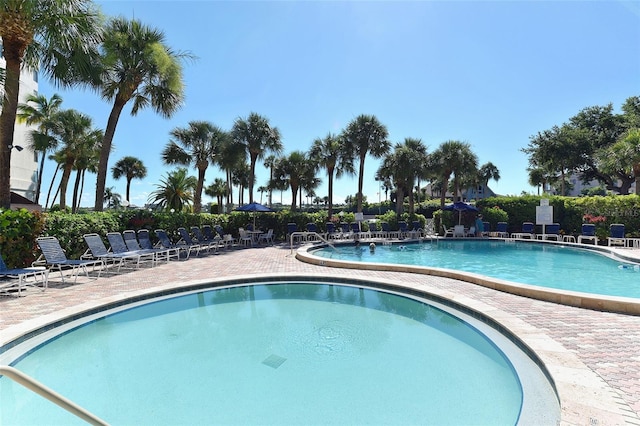 community pool with a patio