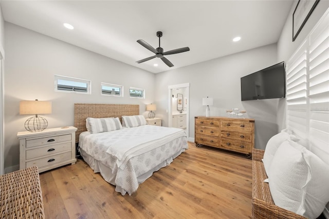 bedroom featuring recessed lighting, light wood-type flooring, connected bathroom, and ceiling fan