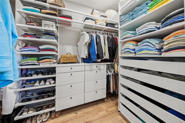 spacious closet with light wood-style flooring