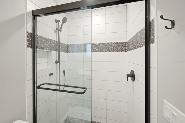 full bathroom featuring a stall shower