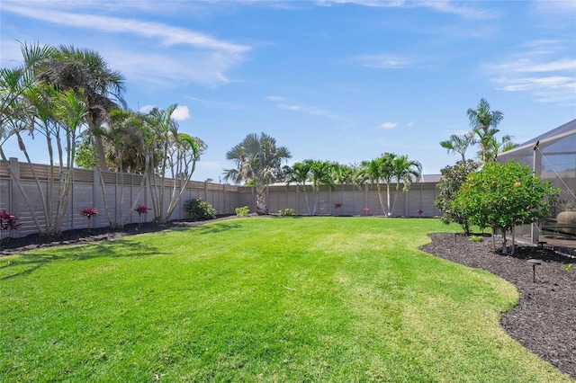 view of yard featuring a fenced backyard