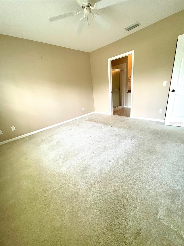 2060 Willow Hammock Cir Unit 201, Punta Gorda, FL 33983 - carpeted spare room featuring baseboards and ceiling fan