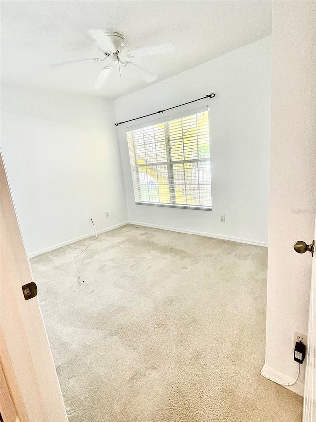 2060 Willow Hammock Cir Unit 201, Punta Gorda, FL 33983 - empty room featuring carpet flooring and baseboards