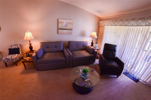 carpeted living room featuring lofted ceiling