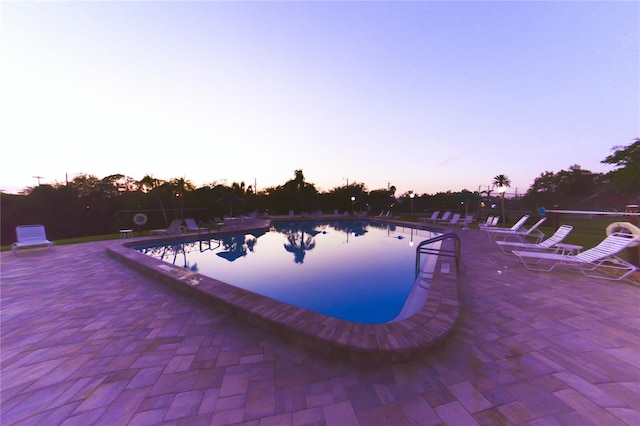 community pool featuring a patio area