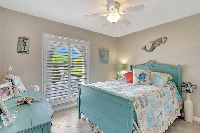 3807 41st Street Ct W Unit 52, Bradenton, FL 34205 - bedroom with light tile patterned flooring, baseboards, access to outside, and ceiling fan