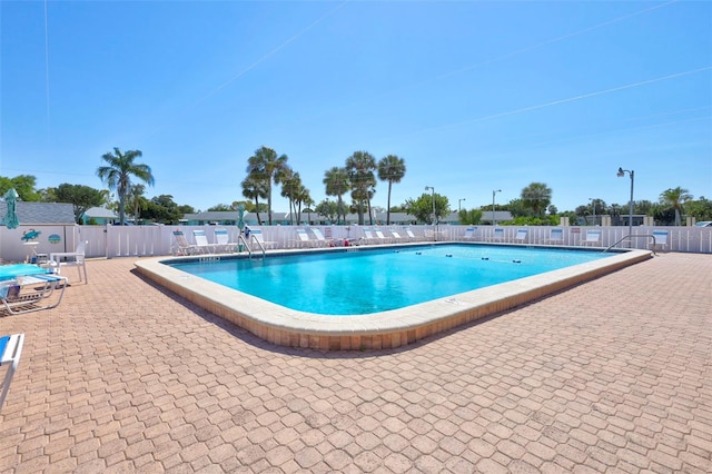 3807 41st Street Ct W Unit 52, Bradenton, FL 34205 - community pool featuring fence and a patio area