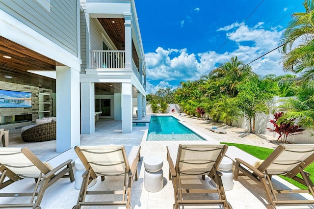 view of pool featuring a patio area, a fenced in pool, and a fenced backyard