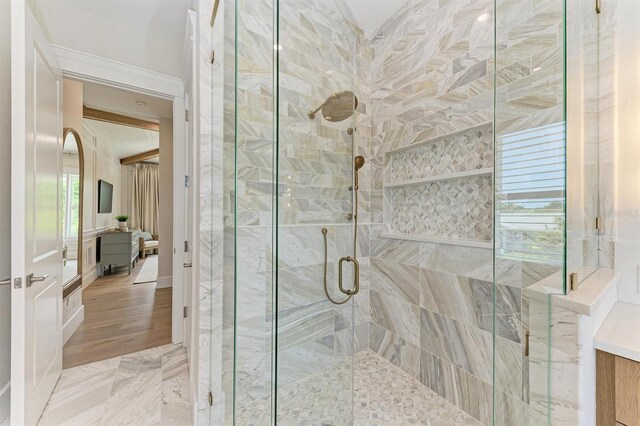 bathroom with a shower stall