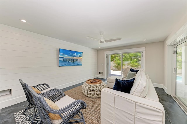 sitting room with recessed lighting, baseboards, and ceiling fan