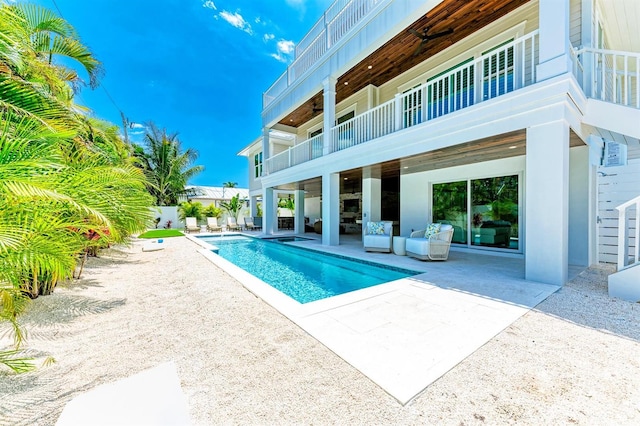 view of swimming pool with a fenced in pool and a patio area