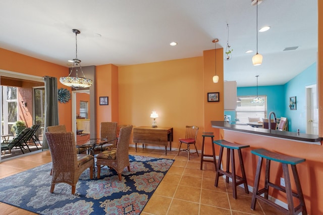 dining space with recessed lighting, visible vents, and tile patterned floors