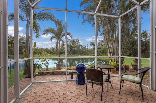 sunroom with a water view