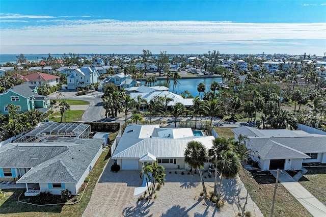 aerial view with a residential view and a water view