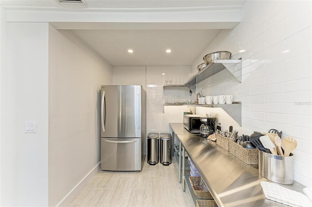 kitchen featuring open shelves, recessed lighting, visible vents, appliances with stainless steel finishes, and baseboards