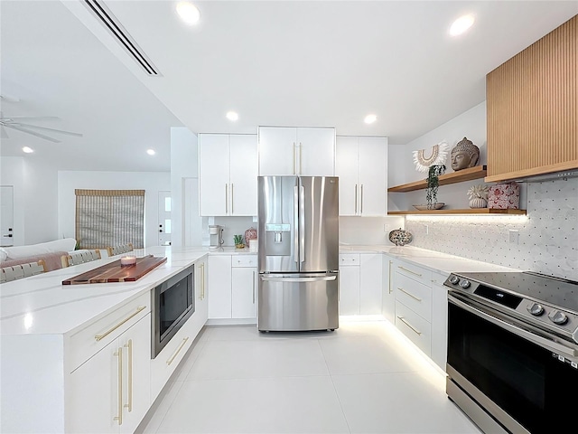 kitchen featuring tasteful backsplash, a peninsula, stainless steel appliances, open shelves, and recessed lighting