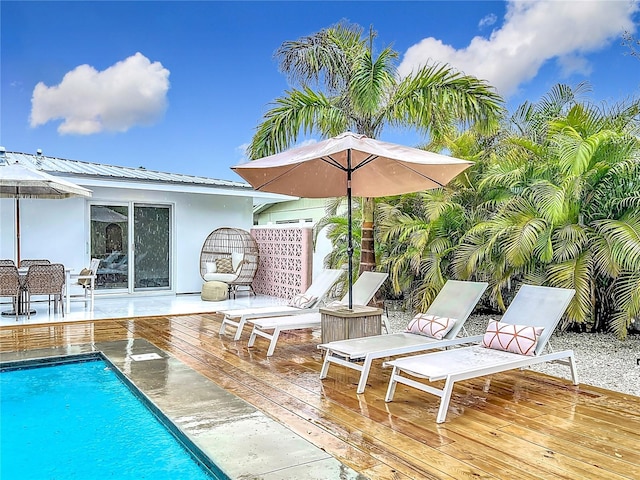 exterior space with an outdoor pool