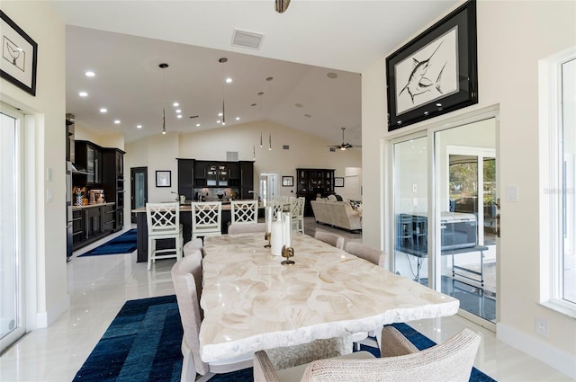 dining room with visible vents, a ceiling fan, recessed lighting, baseboards, and lofted ceiling