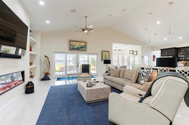 living room with tile patterned floors, high vaulted ceiling, recessed lighting, a multi sided fireplace, and ceiling fan