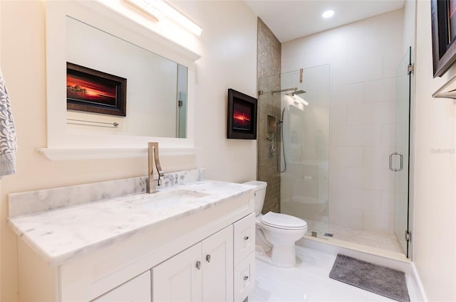 full bath featuring vanity, a fireplace, recessed lighting, a shower stall, and toilet