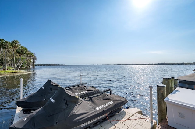 view of dock with a water view