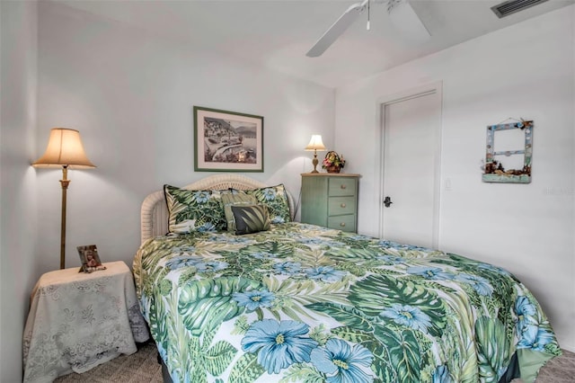 bedroom with visible vents and a ceiling fan