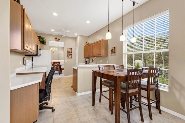 dining space featuring recessed lighting, light tile patterned floors, a ceiling fan, and baseboards