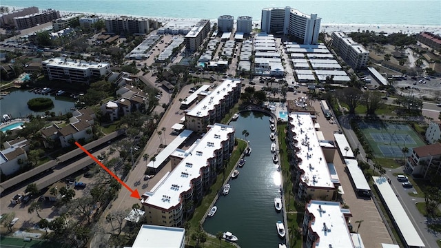 aerial view featuring a city view and a water view