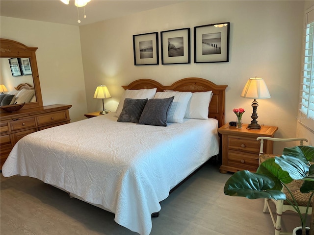 bedroom with wood finished floors