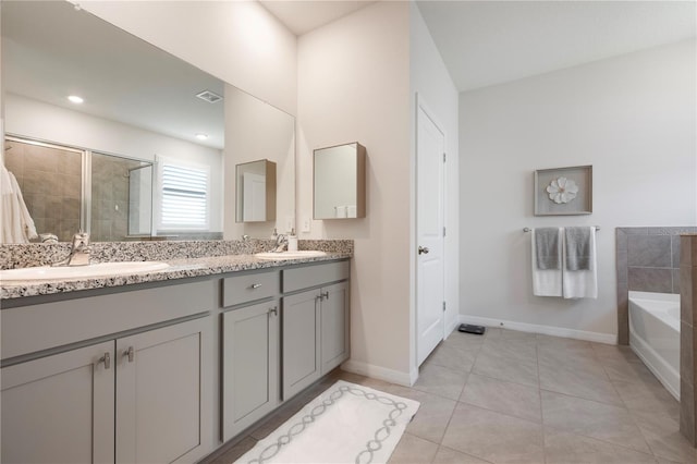 full bath featuring visible vents, a sink, a shower stall, tile patterned flooring, and a bath