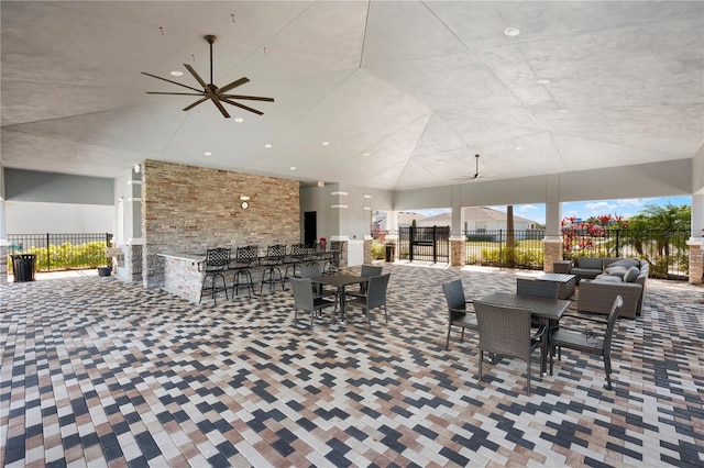 view of patio / terrace featuring ceiling fan, outdoor lounge area, and fence