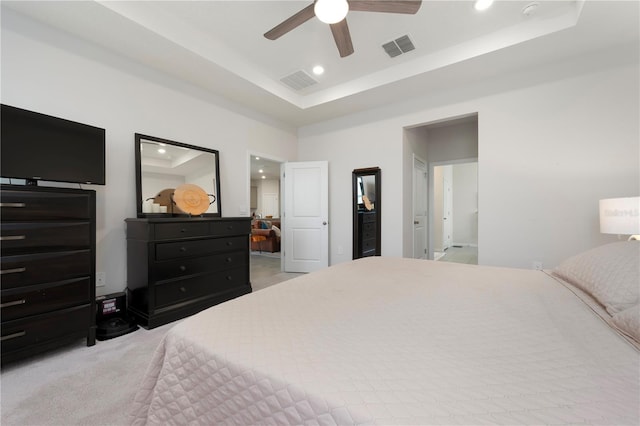 3677 Turning Tides Ter, Bradenton, FL 34208 - bedroom with a raised ceiling, recessed lighting, light carpet, and a ceiling fan