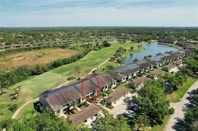 drone / aerial view featuring a water view and golf course view