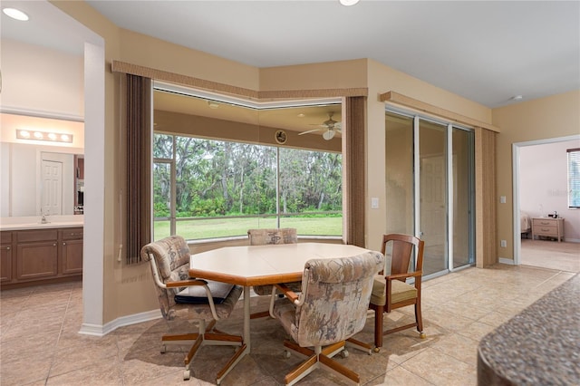 dining space featuring baseboards