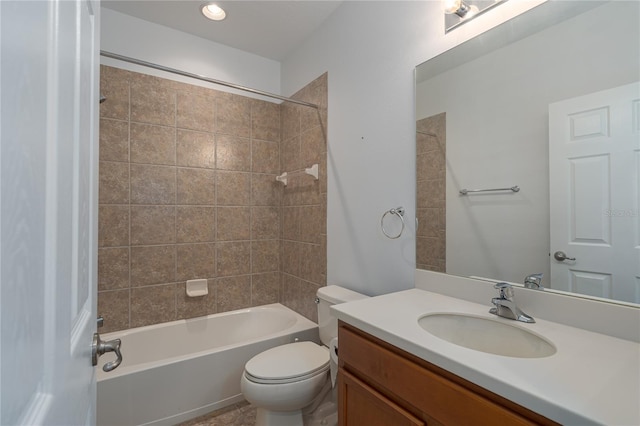 bathroom with toilet, vanity, and bathtub / shower combination