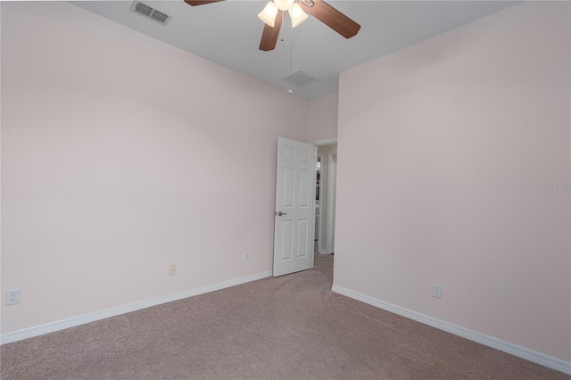 unfurnished room featuring a ceiling fan, baseboards, visible vents, and carpet floors