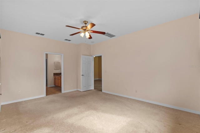 5412 72nd Ter E, Ellenton, FL 34222 - unfurnished bedroom featuring carpet floors, baseboards, connected bathroom, and ceiling fan