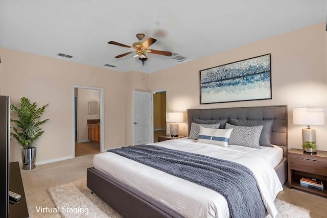 5412 72nd Ter E, Ellenton, FL 34222 - bedroom featuring light carpet, baseboards, ceiling fan, and connected bathroom