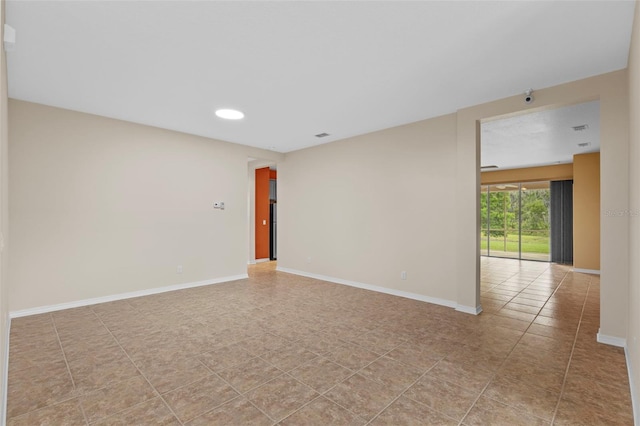 5412 72nd Ter E, Ellenton, FL 34222 - empty room featuring baseboards and recessed lighting