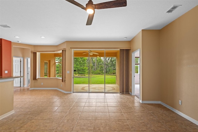 5412 72nd Ter E, Ellenton, FL 34222 - tiled empty room with ceiling fan, baseboards, and recessed lighting